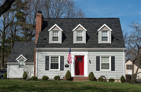 grey metal roof green house red door|gray roof exterior homes.